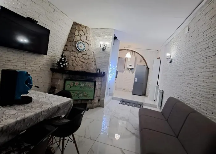 Carmela E Gennaro Виллетта-Барреа